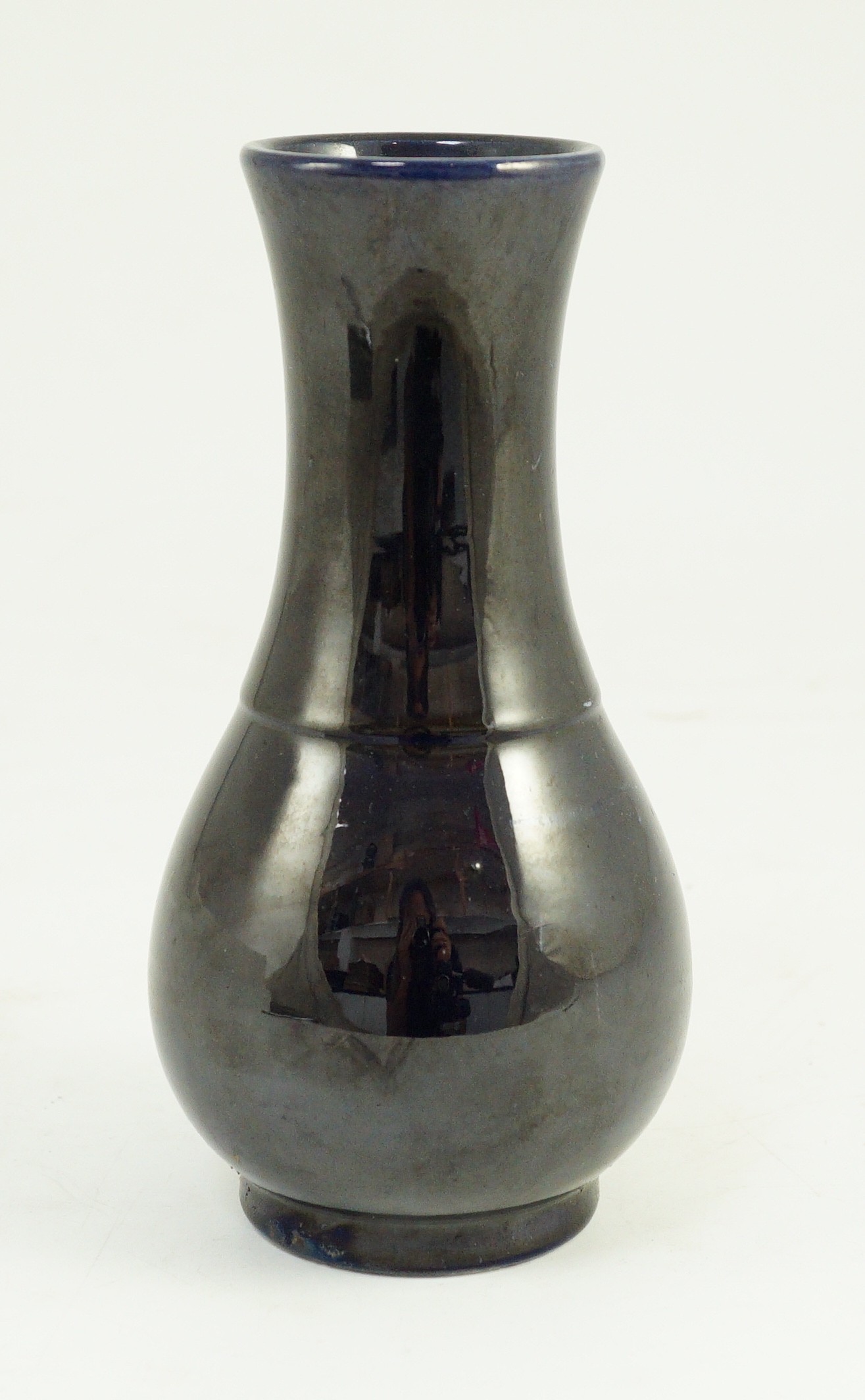 A small Chinese aubergine glazed vase, 18th century, 16.4cm high
